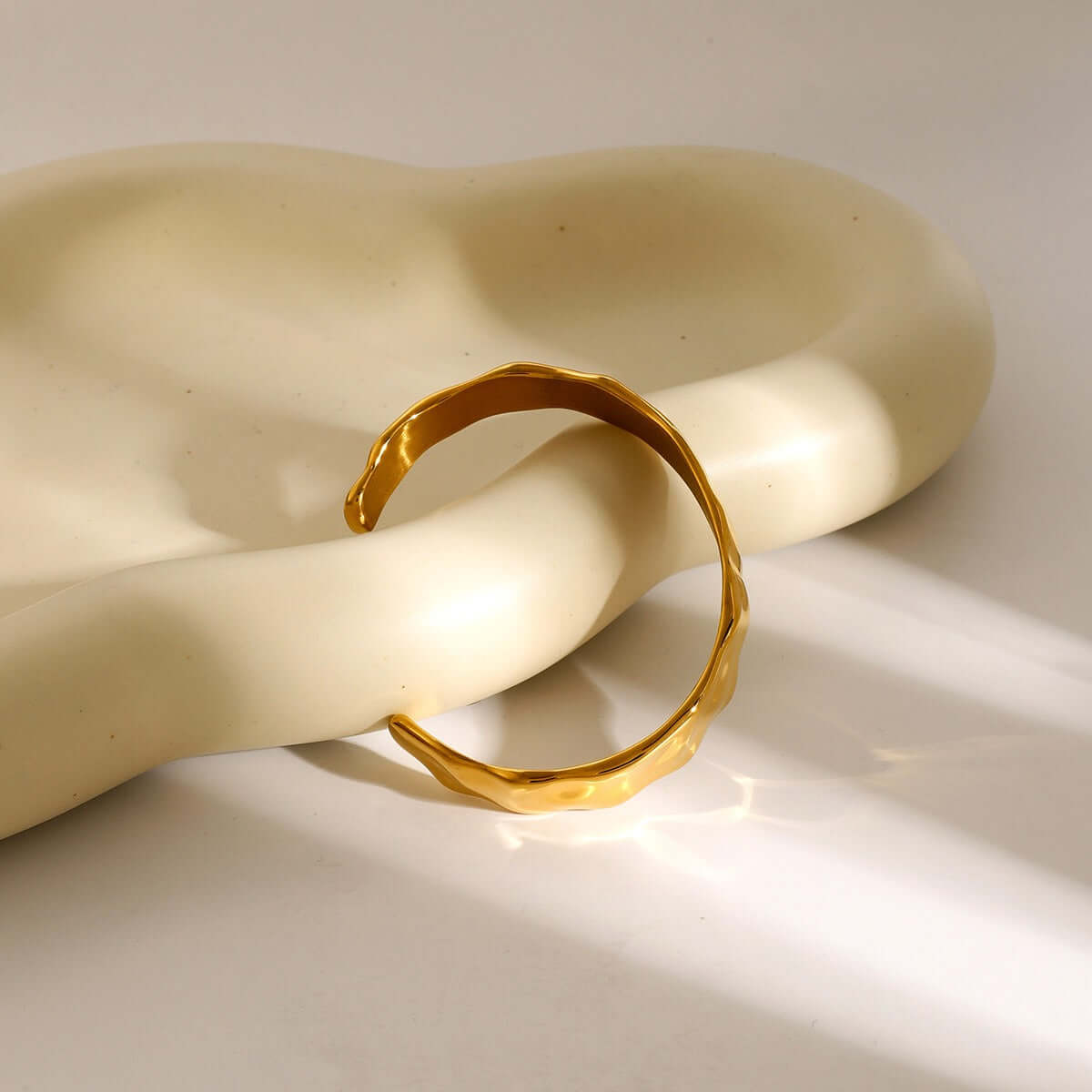 18K gold-plated wide surface bangle with hammer pattern, perfect for everyday wear and layering.