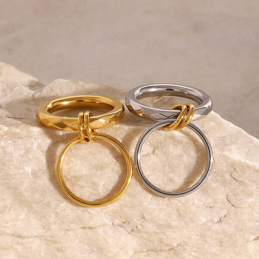 18K gold double-circle interlocking rings on a stone, perfect for affordable everyday jewelry layering.